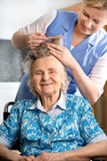 Home Care Aide Grooming Elderly Miami woman